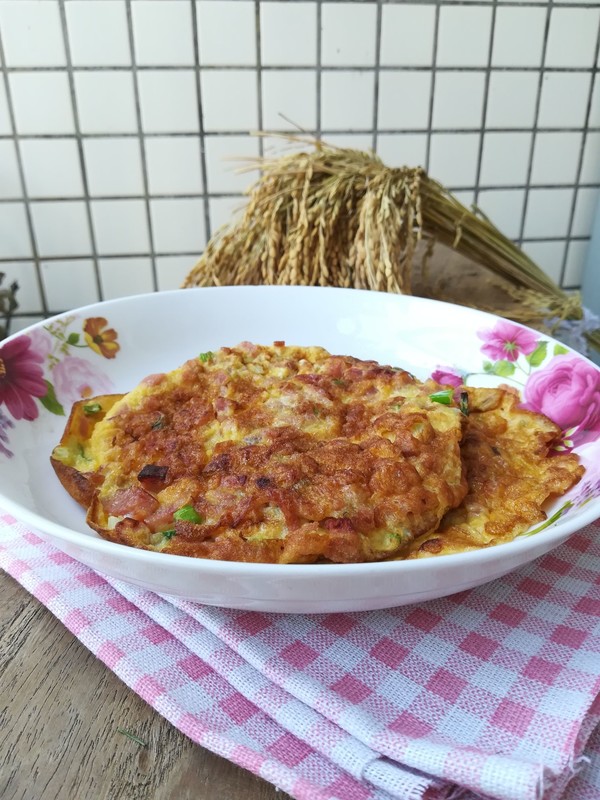 火腿粒煎蛋餅的做法-家常味煎菜譜-易網健康養生網 火腿粒煎蛋餅的做法-家常味煎菜譜